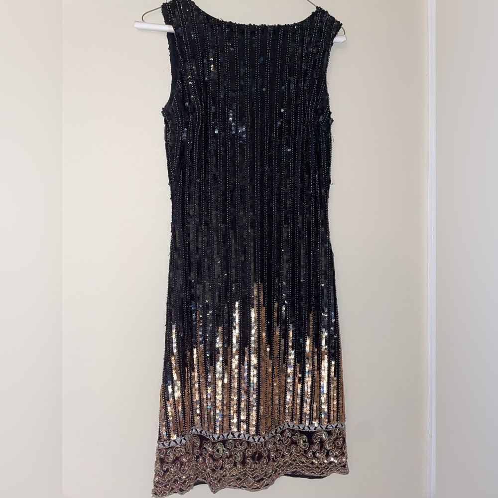 Black and gold sequin dress